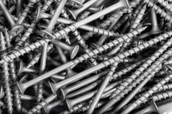 Background pattern of screws — Stock Photo, Image