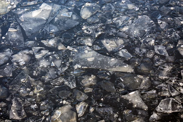 Fios de gelo na água — Fotografia de Stock