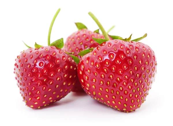 Three red strawberries. — Stock Photo, Image