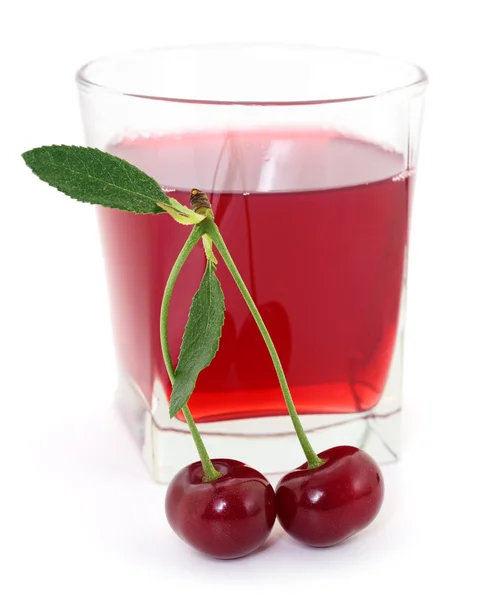 Wiśnie i szklanka soku wiśniowego — Zdjęcie stockowe