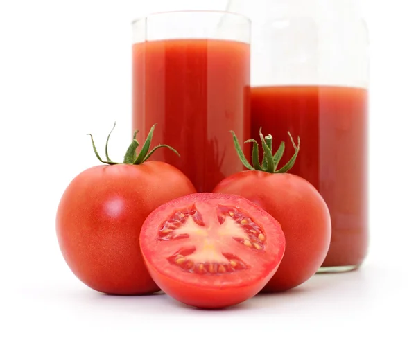 Tomater och tomatjuice. — Stockfoto