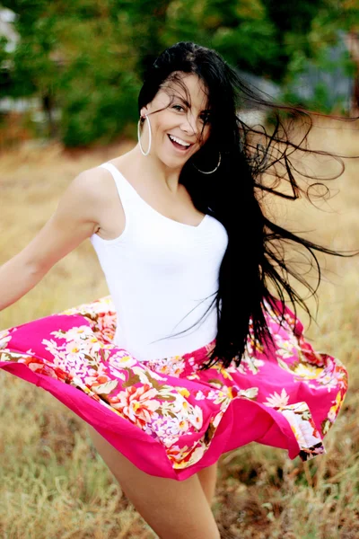 Menina alegre com cabelo voador — Fotografia de Stock