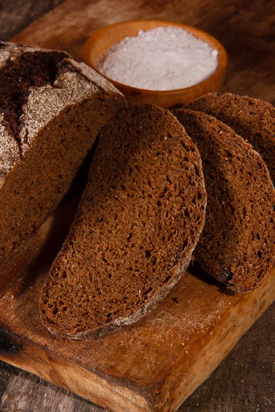 Rye bread on a wooden board — Stock Photo, Image