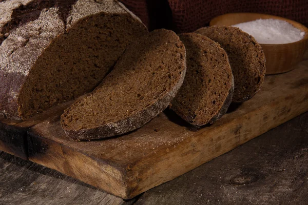 Rye bread on a wooden board — Stock Photo, Image