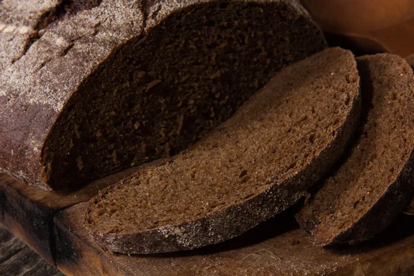 Rye bread on a wooden board — Stock Photo, Image