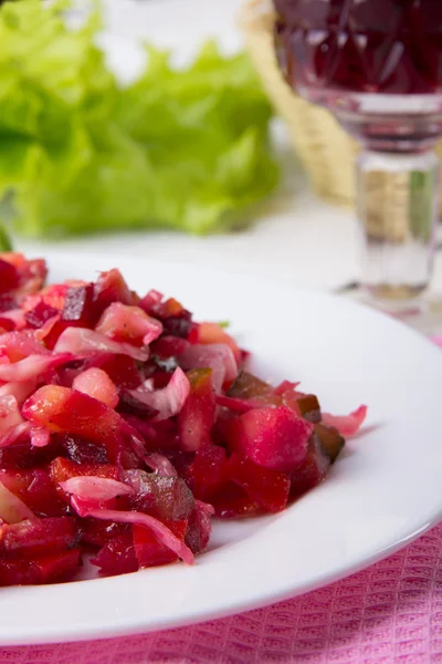 Russian vinaigrette on the  white table — Stock Photo, Image