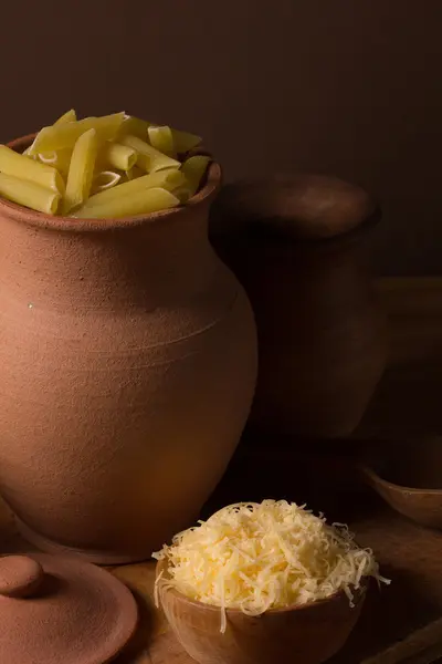 Still life with pasta and ceramic ware — Stock Photo, Image