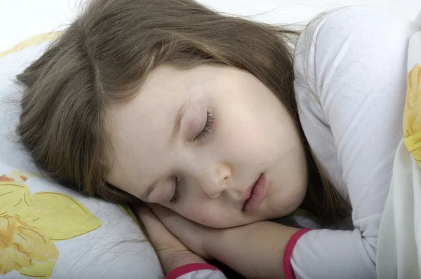 Little girl sleeping in bed — Stock Photo, Image