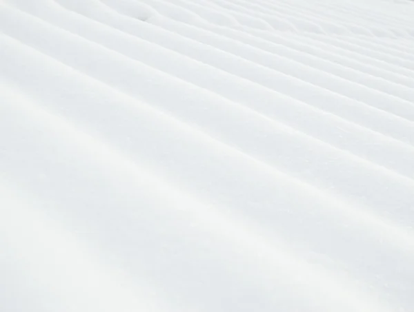 Daken vallende sneeuw — Stockfoto