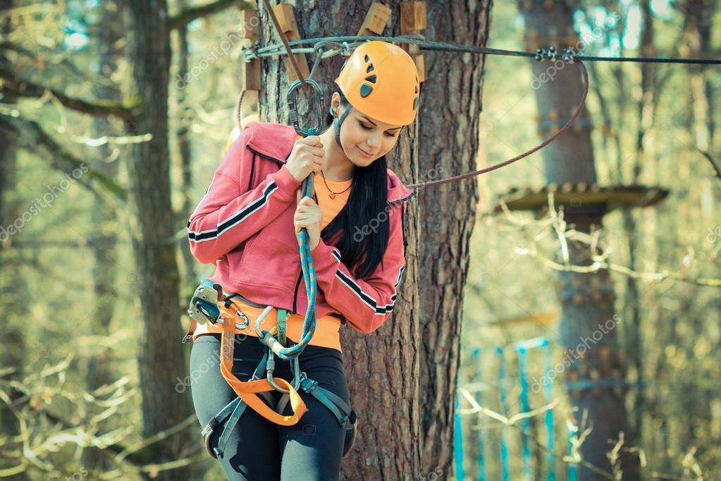 Beautiful girl in the climbing outfit outdoor Stock Photo by