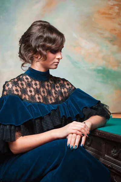 Teenage girl in a vintage dress — Stock Photo, Image