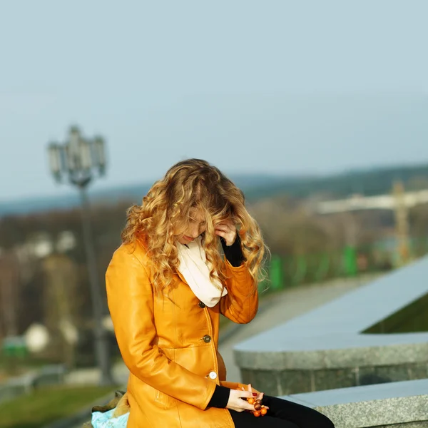 Beautiful girl praying outdoors — Stock Photo, Image