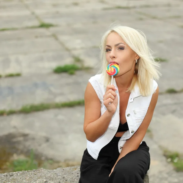 Girl with red lollipop — Stock Photo, Image