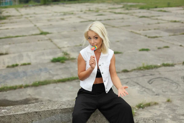 Girl with red lollipop — Stock Photo, Image