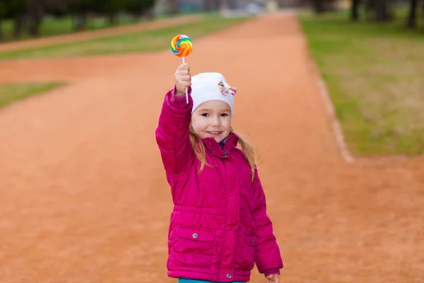 Little girl with lollipop — Stock Photo, Image