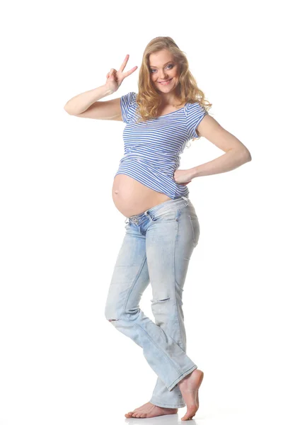 妊娠中の女性を示す勝利のサイン — ストック写真