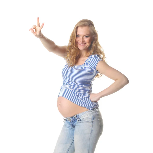 Mulher grávida mostrando sinal de vitória — Fotografia de Stock