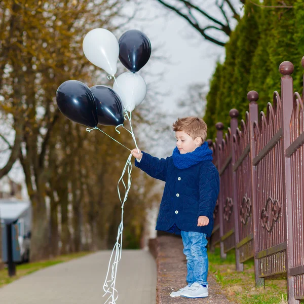 Little boy with balloons — Stock Photo, Image