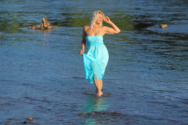 Mature blonde enjoying the sea — Stock Photo, Image