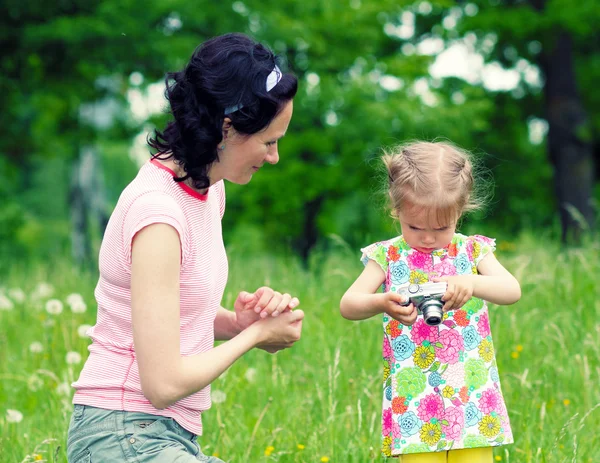 Little girl learning photography — Stock Photo, Image