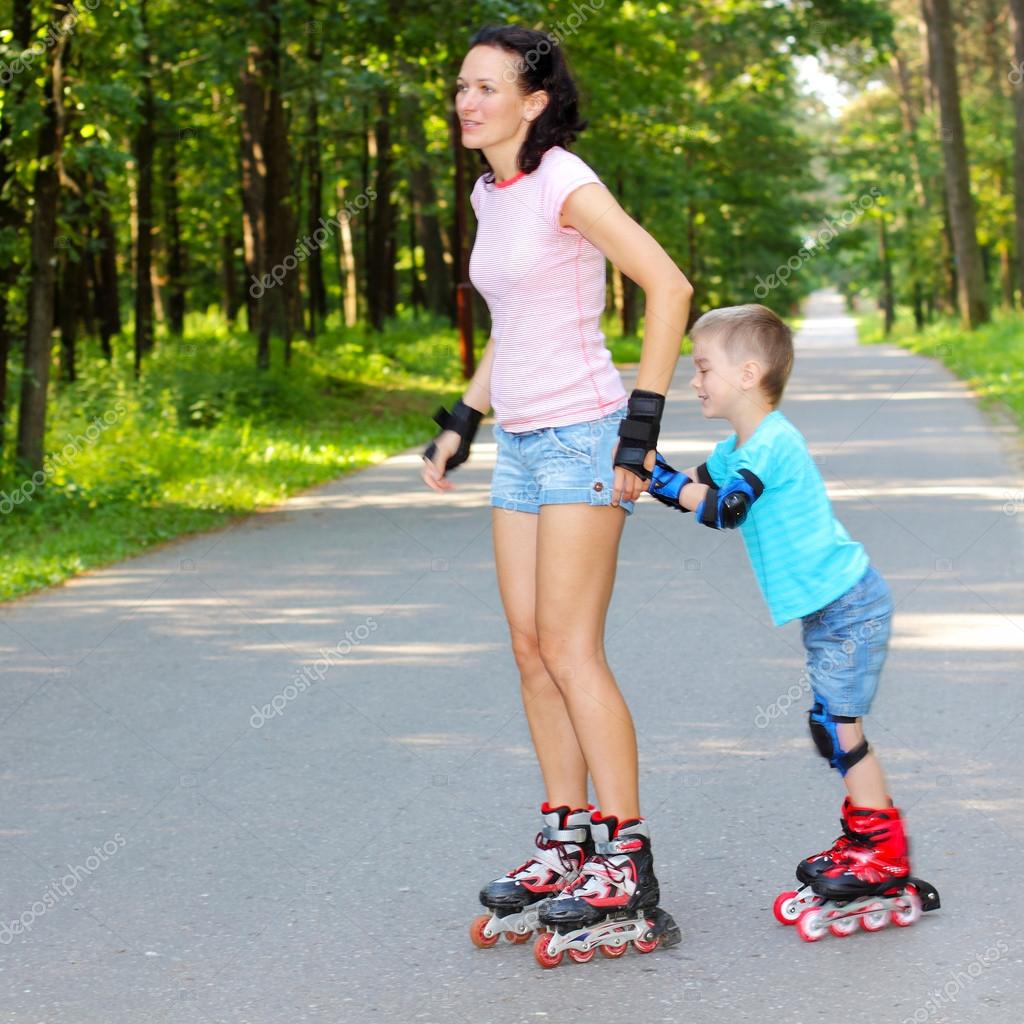 Mother And Son Learn Roller Skating Stock Photo RumisPhoto 55397193 mother-and-son-learn-roller-skating-stock-photo-rumisphoto-55397193