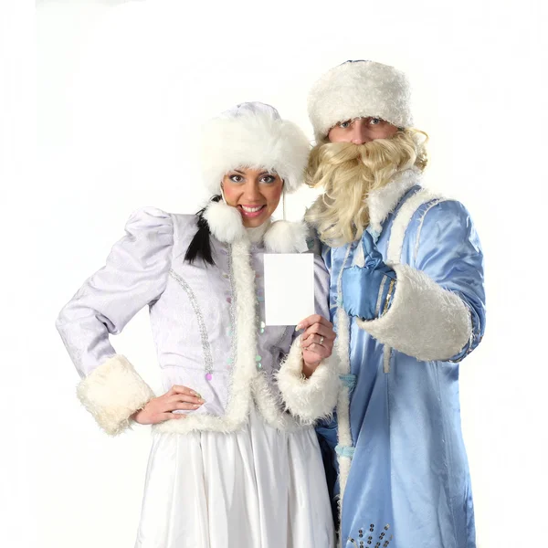 Santa Claus con Santa chica mostrar una hoja blanca — Foto de Stock