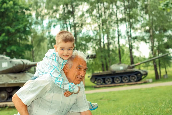 Grandfather with his little grandson on excursion — Stock Photo, Image