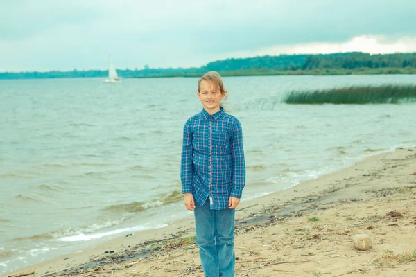 Beautiful teenager on a cloudy day — Stock Photo, Image