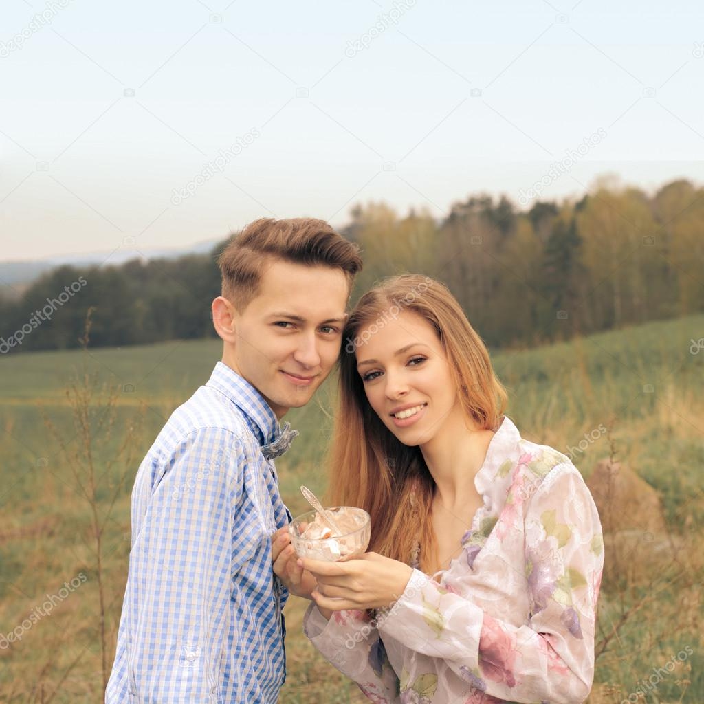 young couple eating ice cream