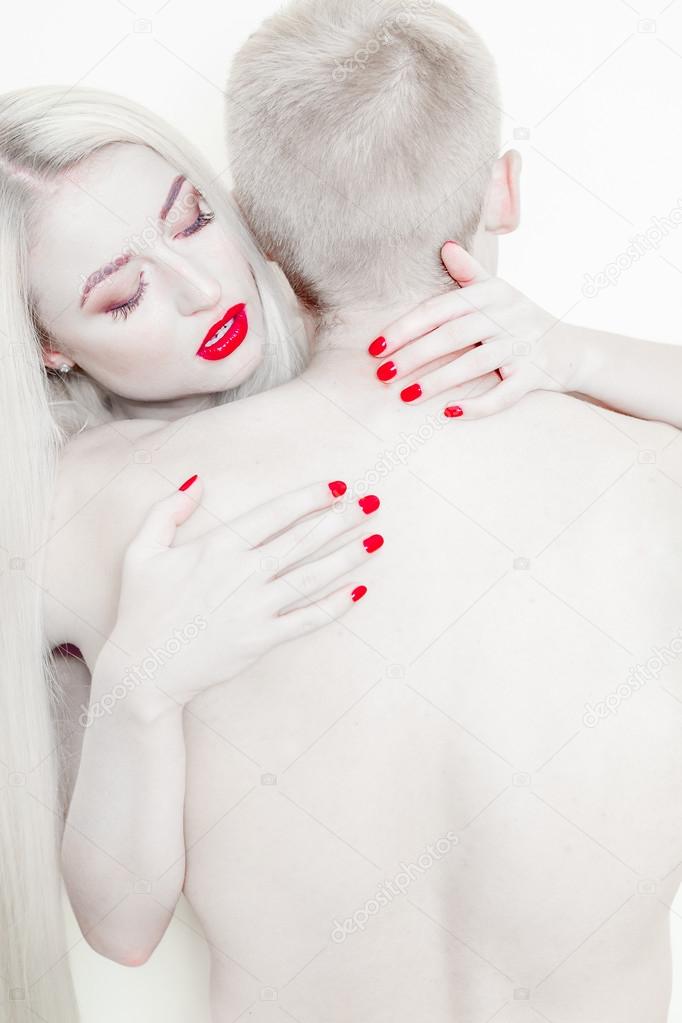 blonde woman and  man, passionate embrace
