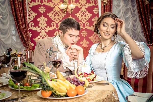 Man in   jacket and girl in vintage dress — Stock Photo, Image