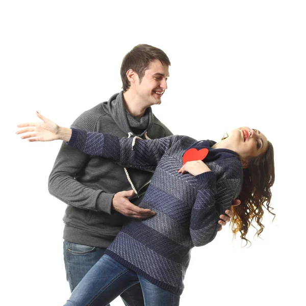 Couple having fun with  paper heart — Stock Photo, Image