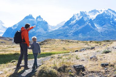 family hiking in patagonia clipart