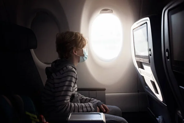 Boy Wearing Face Mask Sitting Airplane Cabin Travel Coronavirus Pandemic Stock Picture