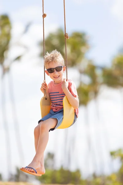 Kid at swing — Stock Photo, Image