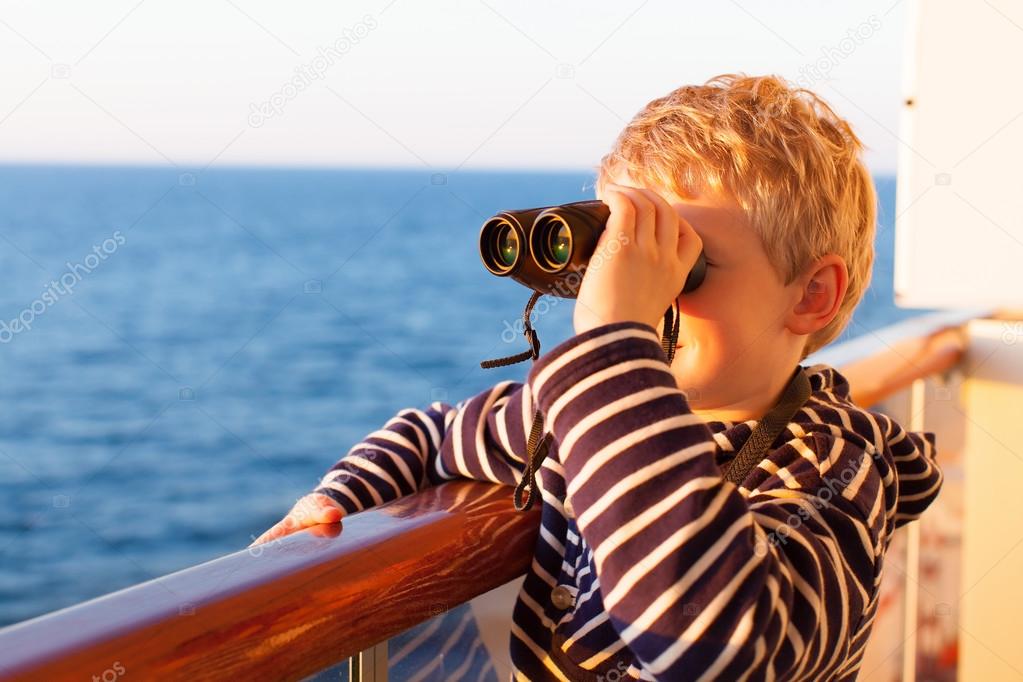 kid cruising with binoculars