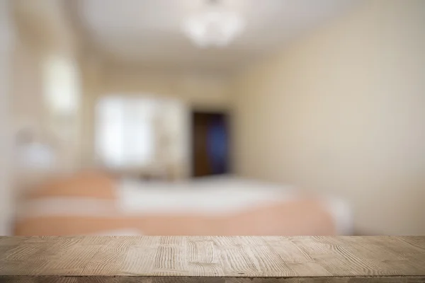 Wooden table in the bedroom — Stock Photo, Image