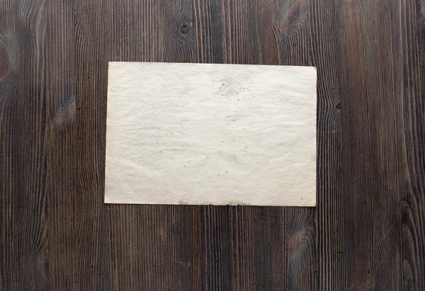 Papier op oud hout — Stockfoto