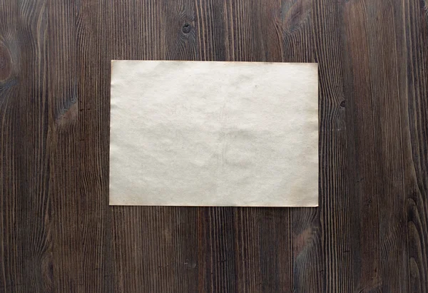 Papier op oud hout — Stockfoto