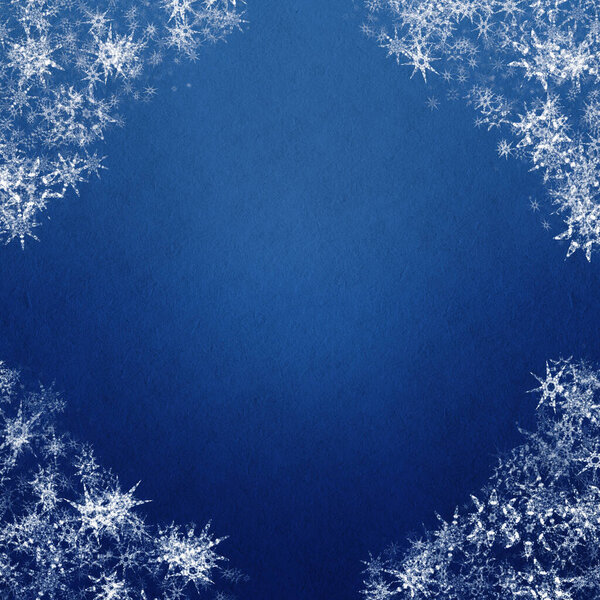 blue winter christmas background with snowflakes
