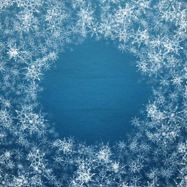blue winter christmas background with snowflakes