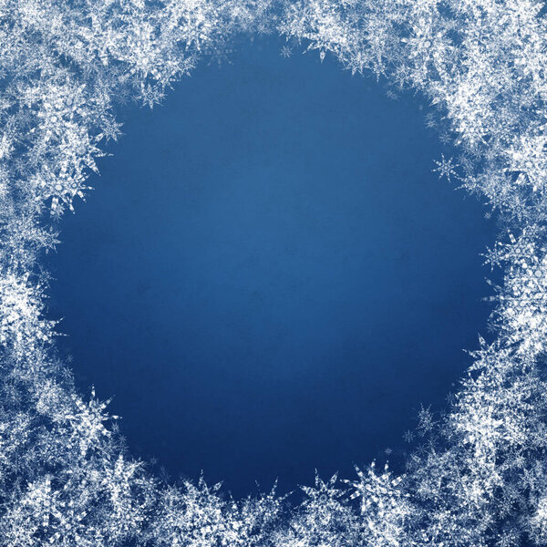 blue winter christmas background with snowflakes
