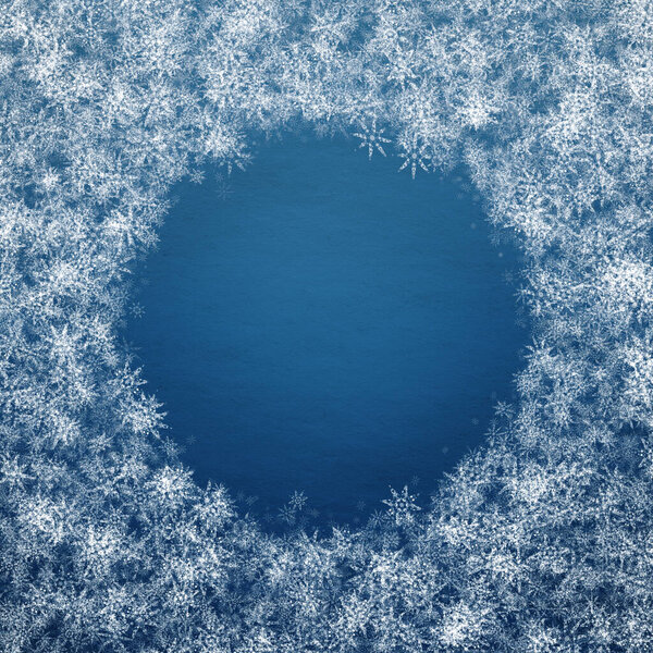 blue winter christmas background with snowflakes
