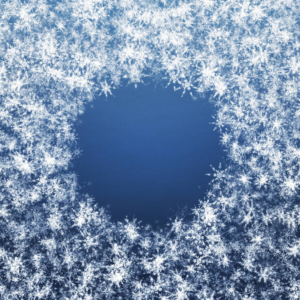blue winter christmas background with snowflakes