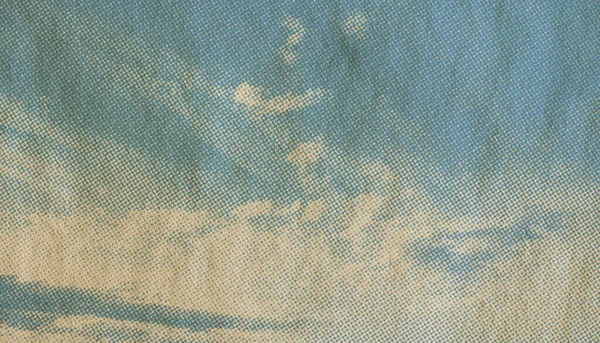 retro sky pattern on old paper texture. vintage clouds.