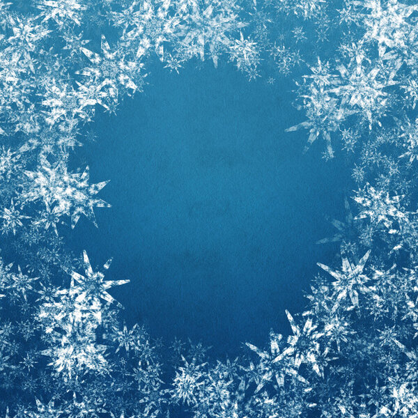 blue winter christmas background with snowflakes