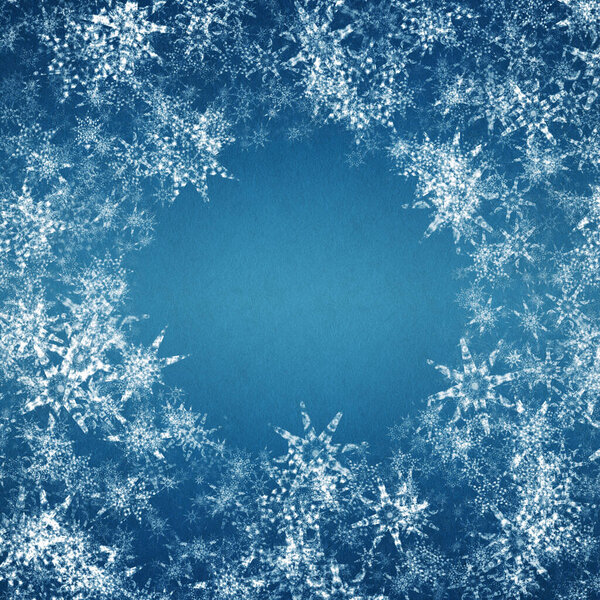 blue winter christmas background with snowflakes