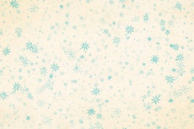 Eski kağıt dokusunda kar taneleri olan eski bir Noel arkaplanı