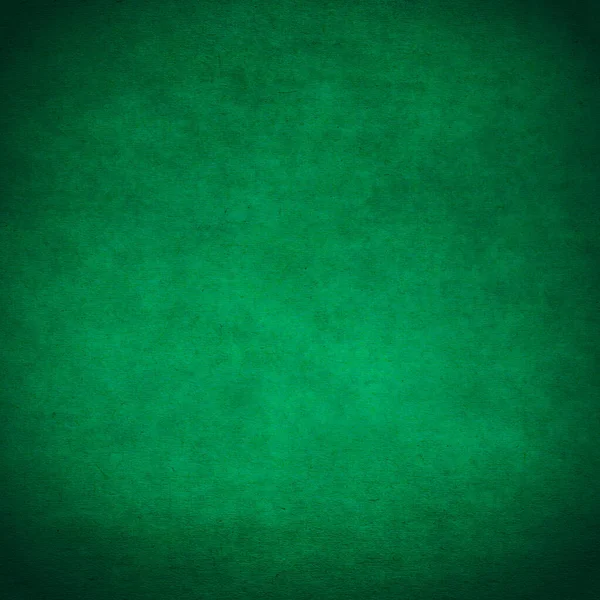 古い黒い紙緑の背景 — ストック写真