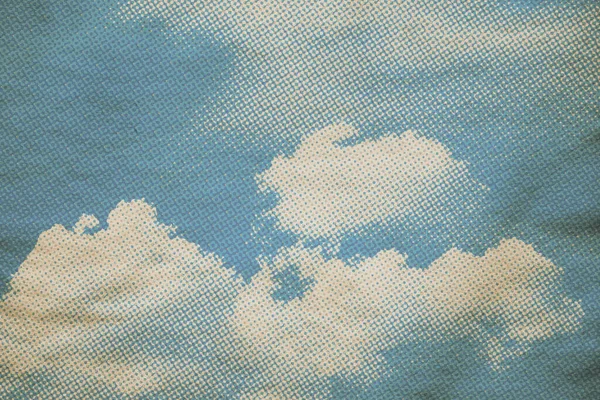 retro sky pattern on old paper texture. vintage clouds.